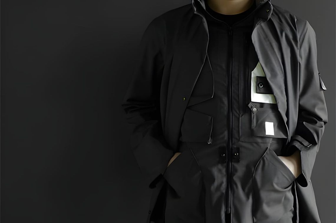 Stone Island Shadow Project Stealth Jacket MK II in black, shown partially open to reveal the concealed interior pocket syste