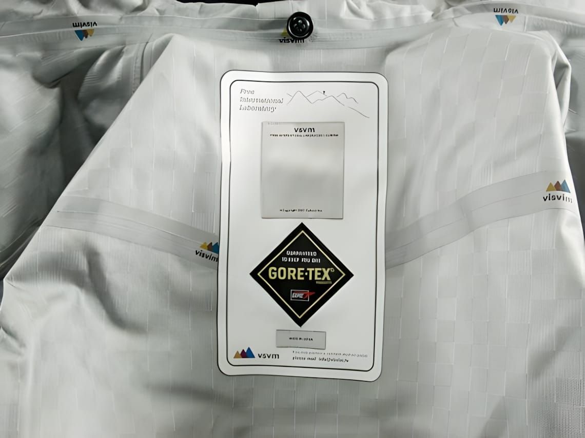 Visvim GORE-TEX shell jacket back, grey allover visvim logo fabric, Free International Laboratory VSVM hang tag