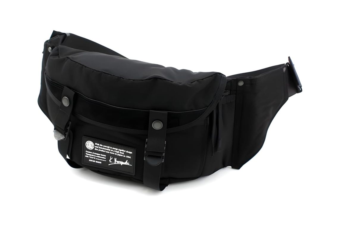 Porter-Yoshida Tanker Waist Bag in black nylon, front three-quarter view showing snap-button front pocket and woven brand lab