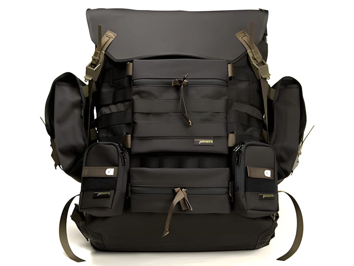 ACRONYM 3A-7TS modular backpack in black, showing four rows of Tec-Sys webbing on the front panel and a top carry handle.
