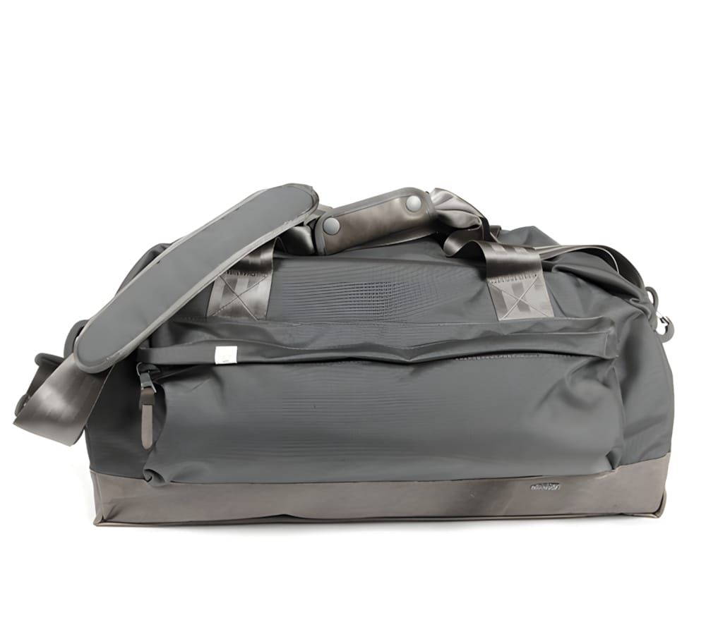 Compact grey North Face duffel bag, 30L, dual carry handles with snap buckle, padded shoulder strap, white label on front.