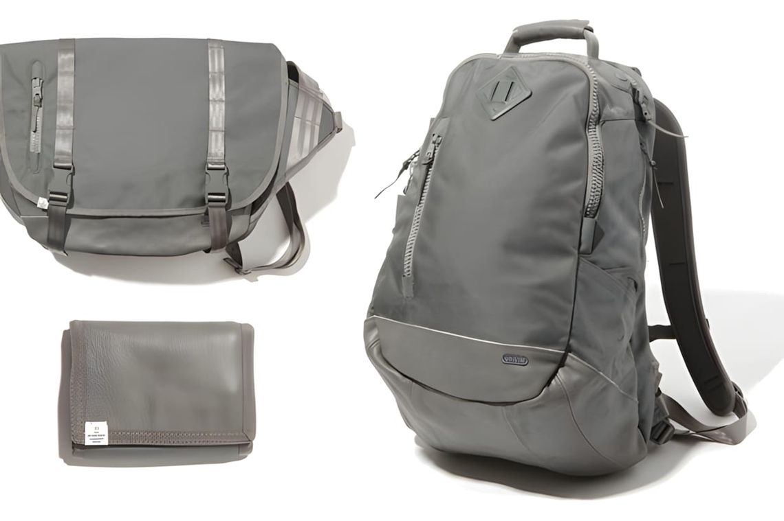 Three Visvim Ballistic Gray Collection pieces on white: a large gray Cordura nylon 20L backpack (right), a gray E-CAT 18L mes