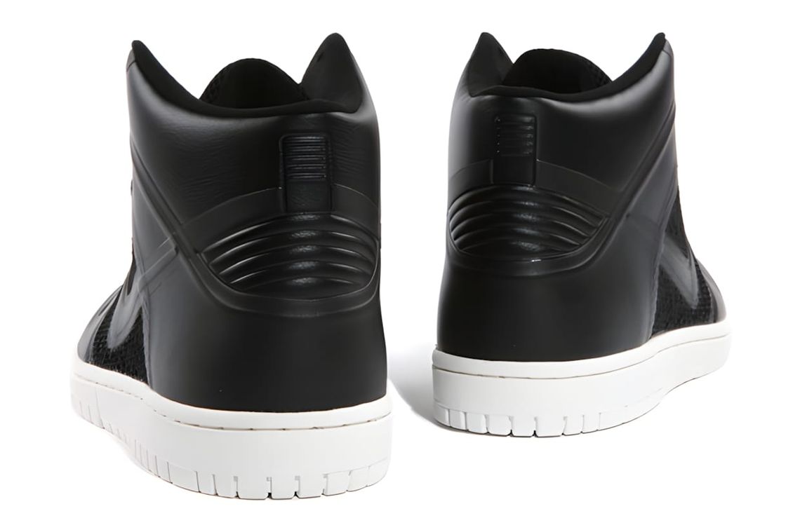 Nike Dunk High Fuse QS in Black/Sail colorway — black Hyperfuse-constructed upper with sail-white midsole and outsole, style 