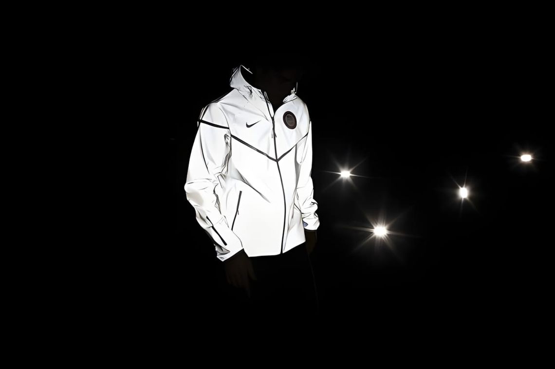 Nike 2012 Olympic Team USA Windrunner jacket in silver 3M reflective material with Team USA badge
