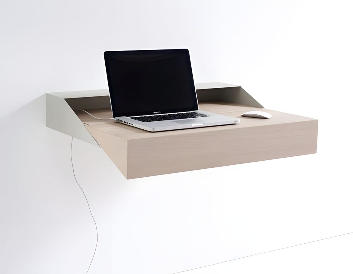 Raw Edges DeskBox for Arco shown in open position: a wall-mounted folding desk with a pale natural oak surface and off-white 