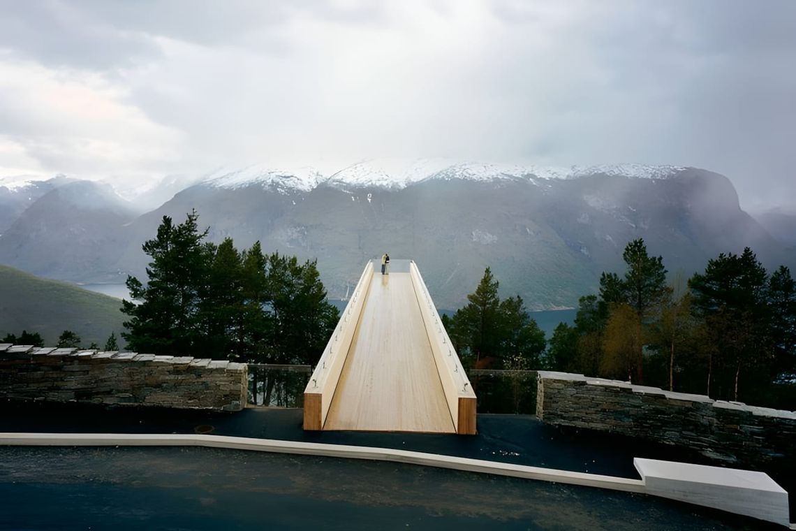 Stegastein viewpoint platform extending from the mountainside above Aurlandsfjord, Norway, clad in timber, designed by Saunde