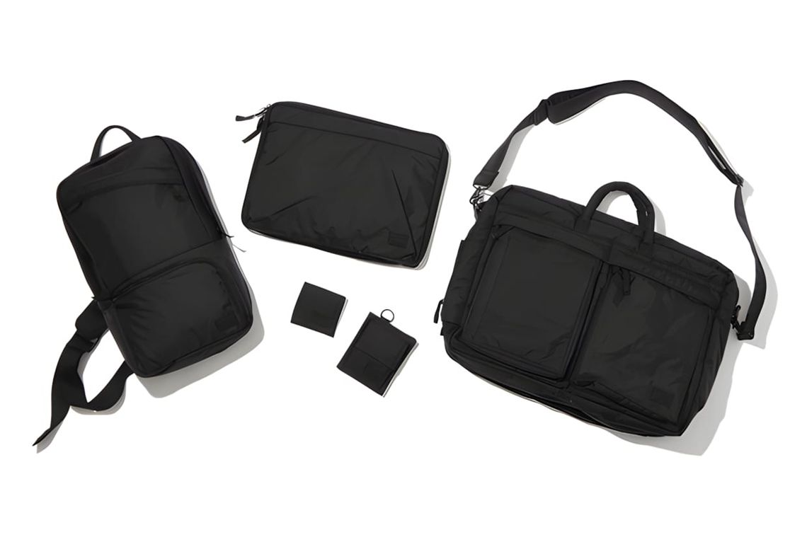 Head Porter Black Beauty flat lay: backpack, laptop sleeve, messenger shoulder bag, and two wallets in black Cordura nylon.