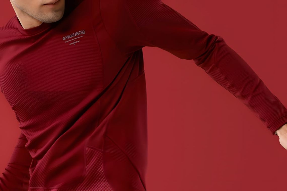 Nike x Undercover Gyakusou SS2014 Sweat Map long-sleeve top in deep crimson, GYAKUSOU chest logo visible.