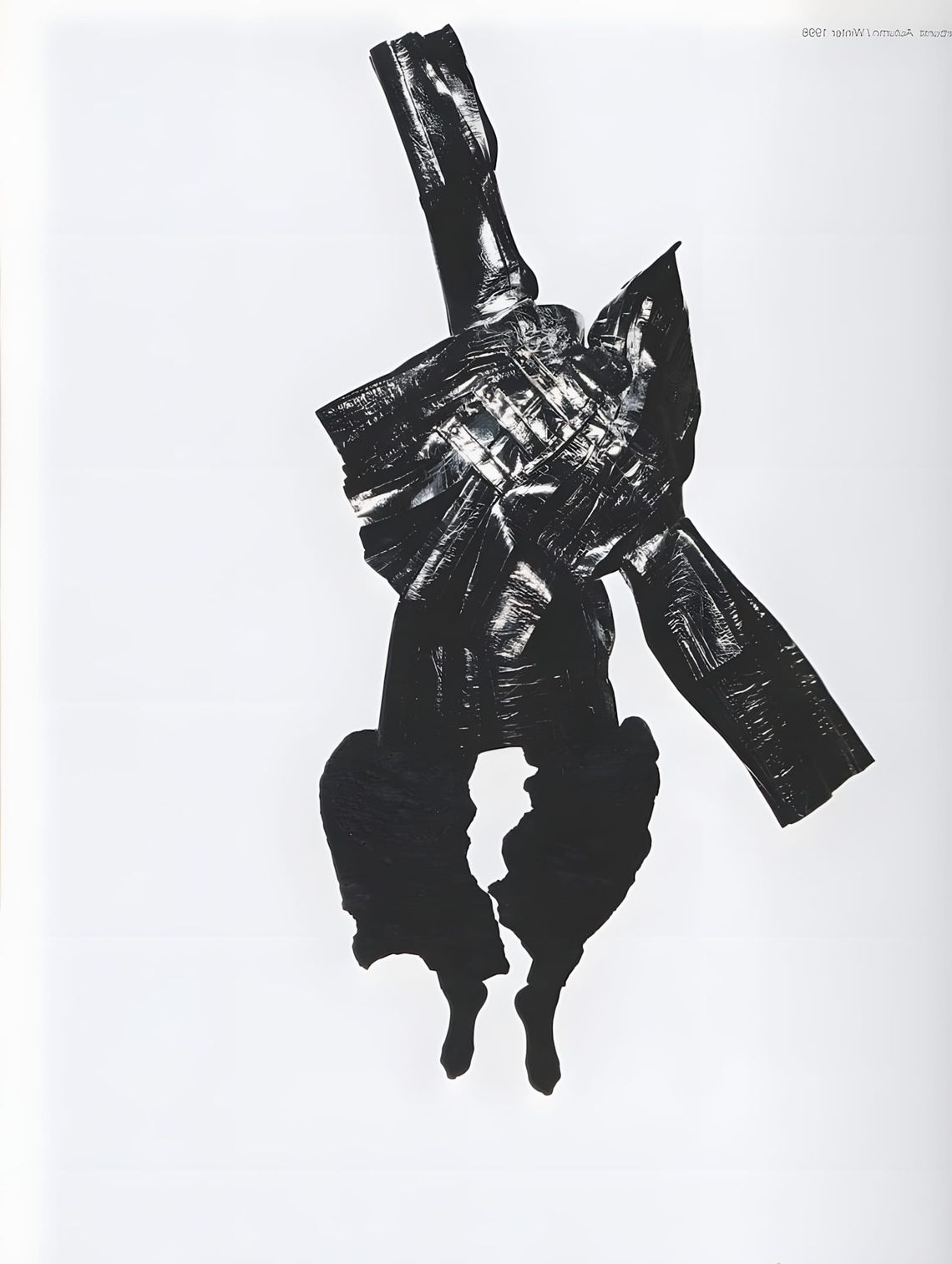 Irving Penn Two Miyake Warriors photograph showing two figures in sculptural Issey Miyake pleated garments