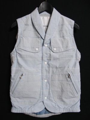 white mountaineering vest