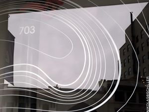 SiO Signage System — Window Installation with Directional Arrow