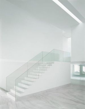 Modern Staircase with Glass Balustrade — Aires Mateus Architecture