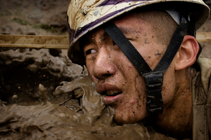 US Marine in the Mud — Combat Training