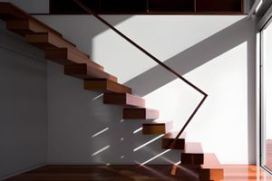 Floating Timber Staircase with Angular Steel Rail