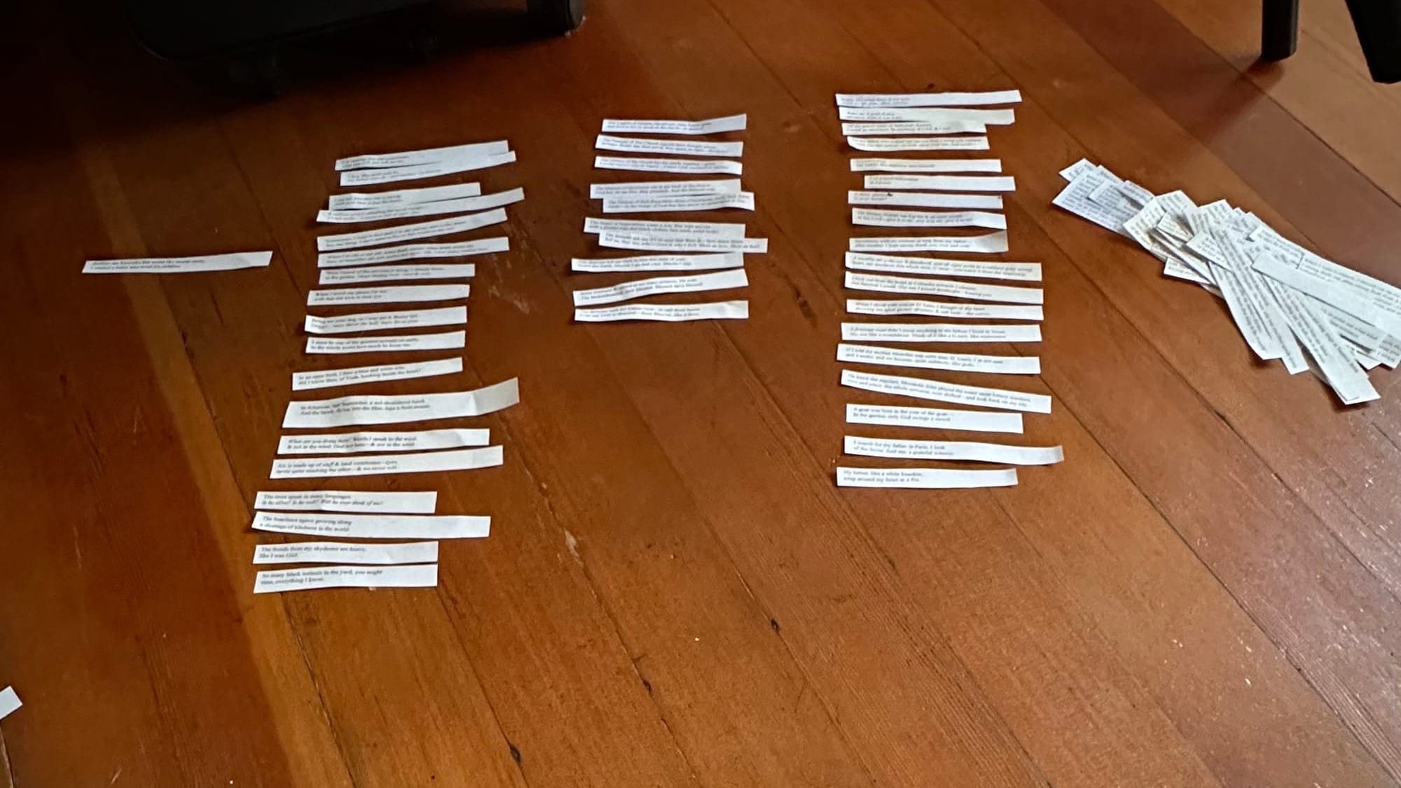 A series of paper strips to help me sequence the poems in a collection