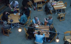 Couples eating a restaurant, a metaphor which will make sense later.