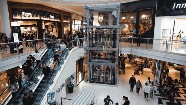 Busy retail store filled with shoppers.
