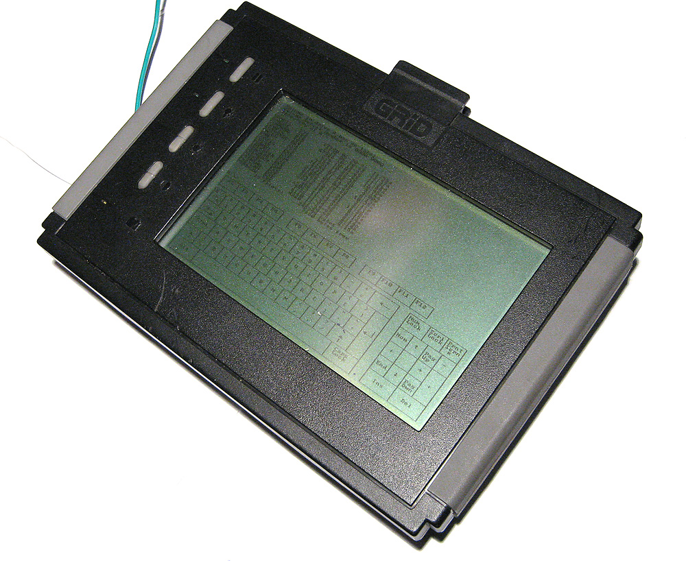GRiDPad tablet computer from 1990, a large gray pen-based slate with a stylus