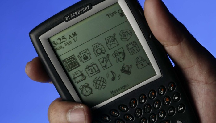 BlackBerry 5810 from 2002, a handheld with a full QWERTY keyboard and monochrome screen