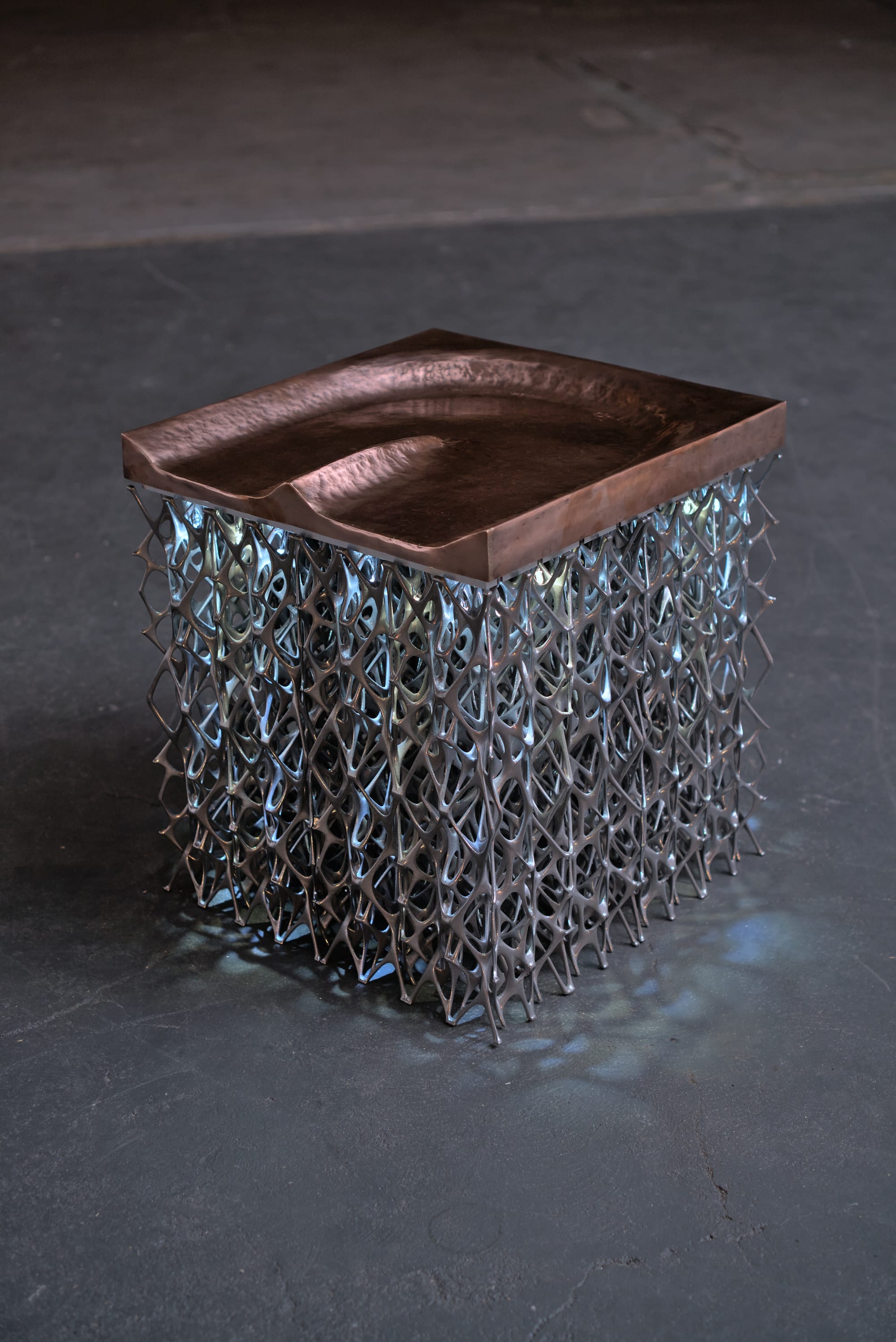 Peltchair by Lilian van Daal and Studio Synergy. Photography by Lilian van Daal and Studio Synergy. Innovative 3D printed innovative from body heat glowing biomimicry inspired seat.