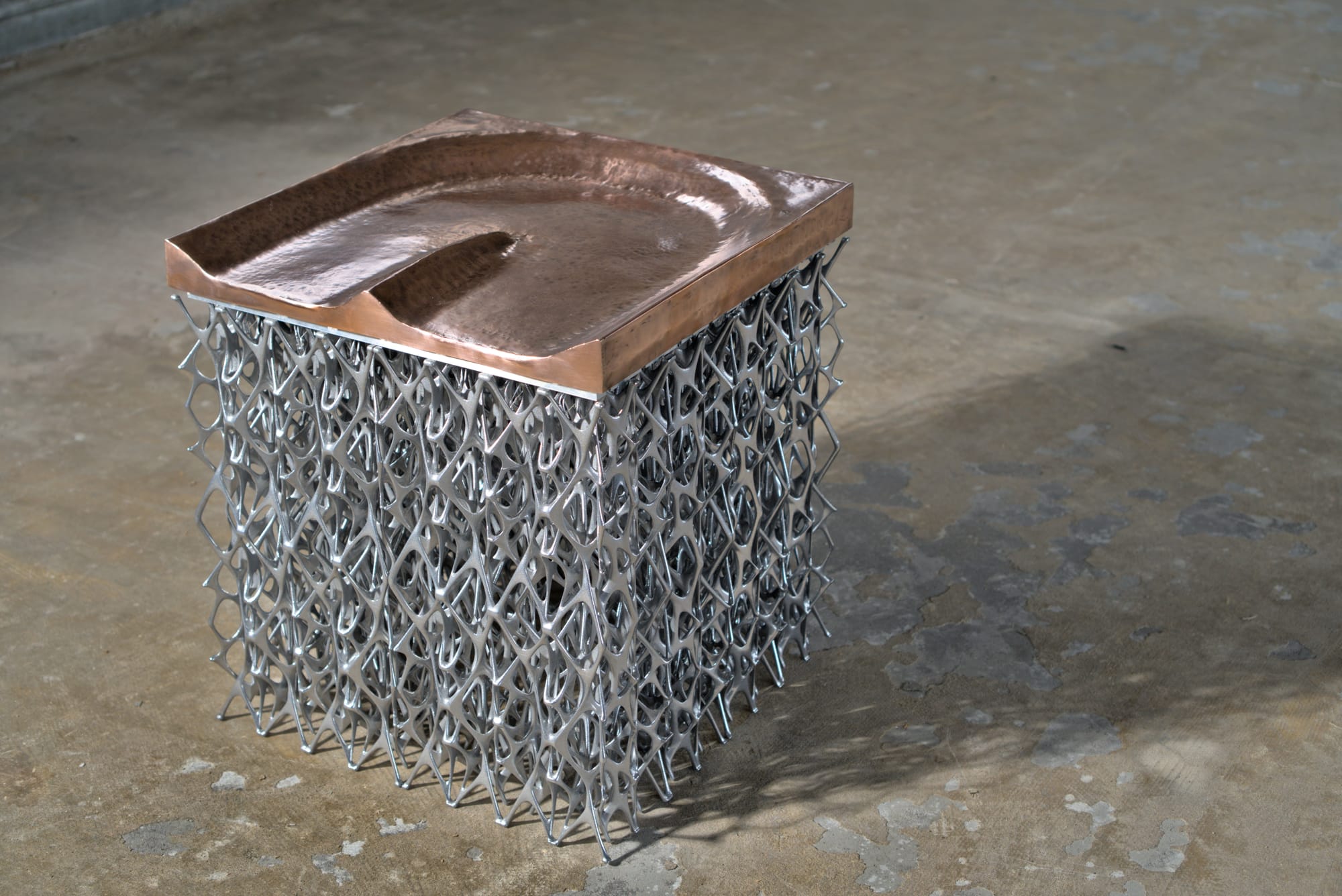Peltchair by Lilian van Daal and Studio Synergy. Photography by Lilian van Daal and Studio Synergy. 3D printed biomimicry inspired copper and aluminum seat.