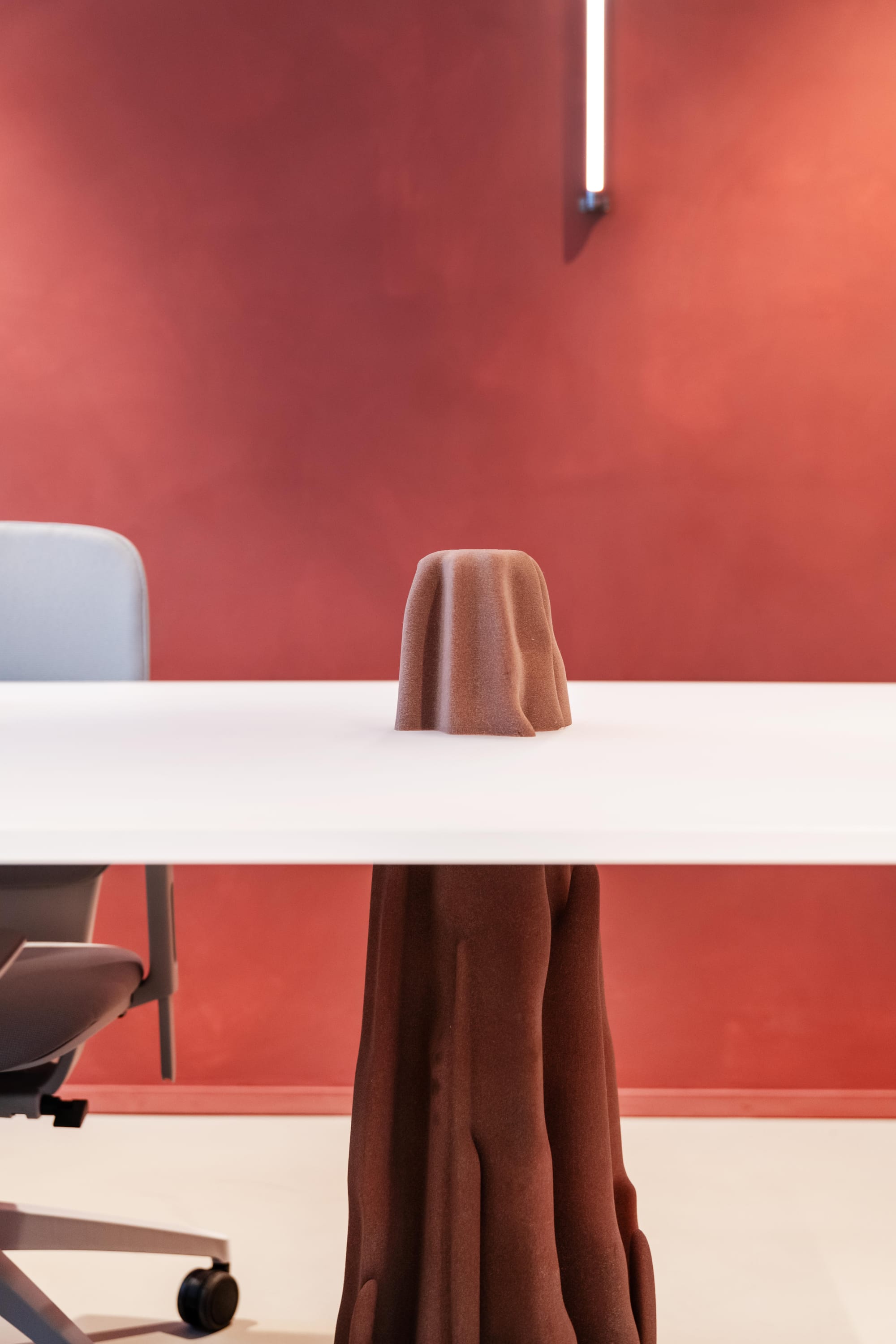Silversquare Co-Working Space by Lilian van Daal. Photography by Marthe Hoet. Biomimicry, termit mound inspired, red table pedestal.