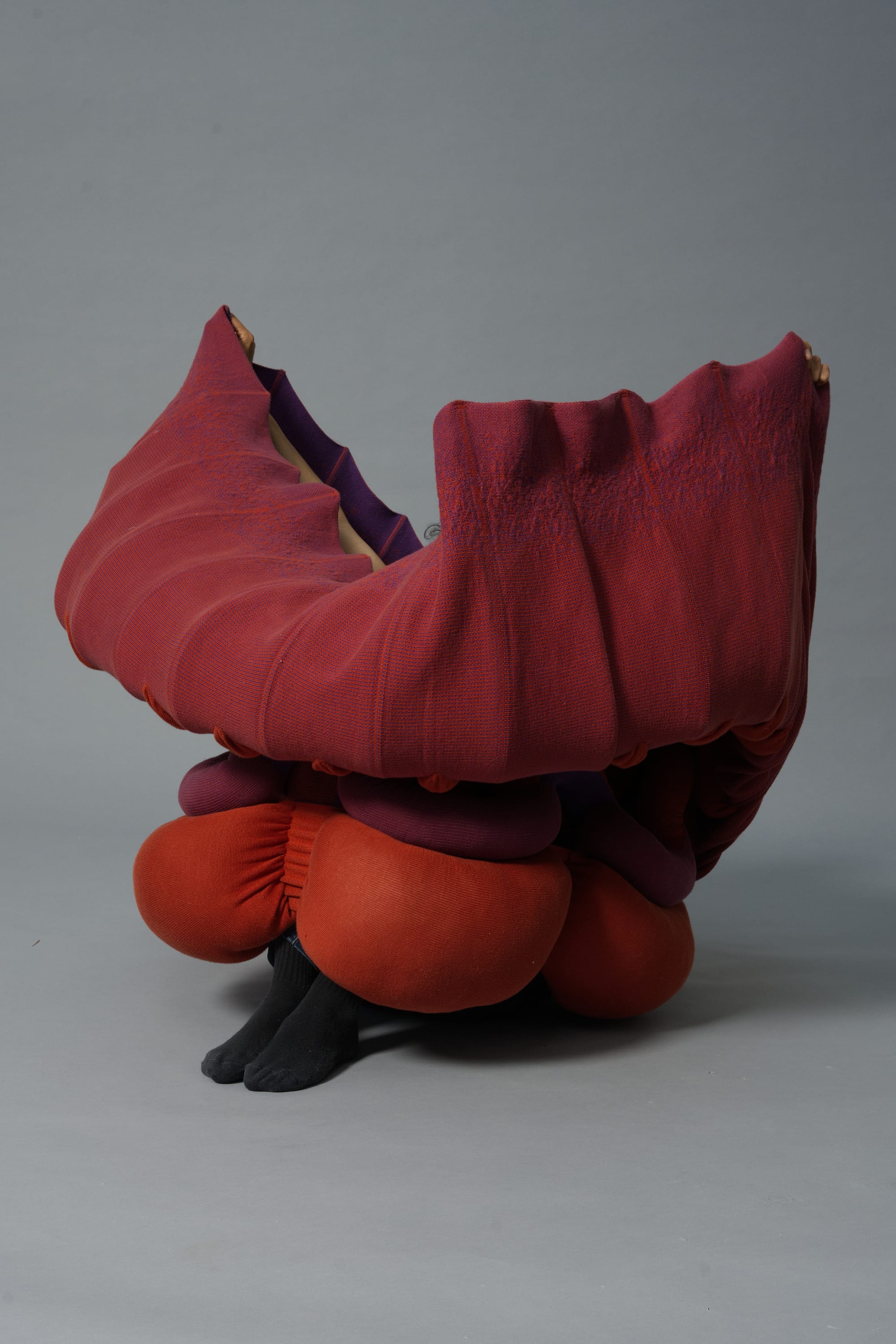 Emone by Luna Haverkorn. Photography by Kasper Heden Andersen. Red, nature informed, innovative furniture piece.