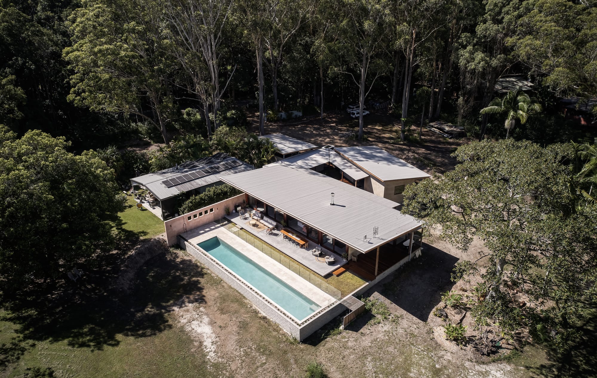 Environmentally conscious, tropical, modern hempcrete architecture surrounded by nature.