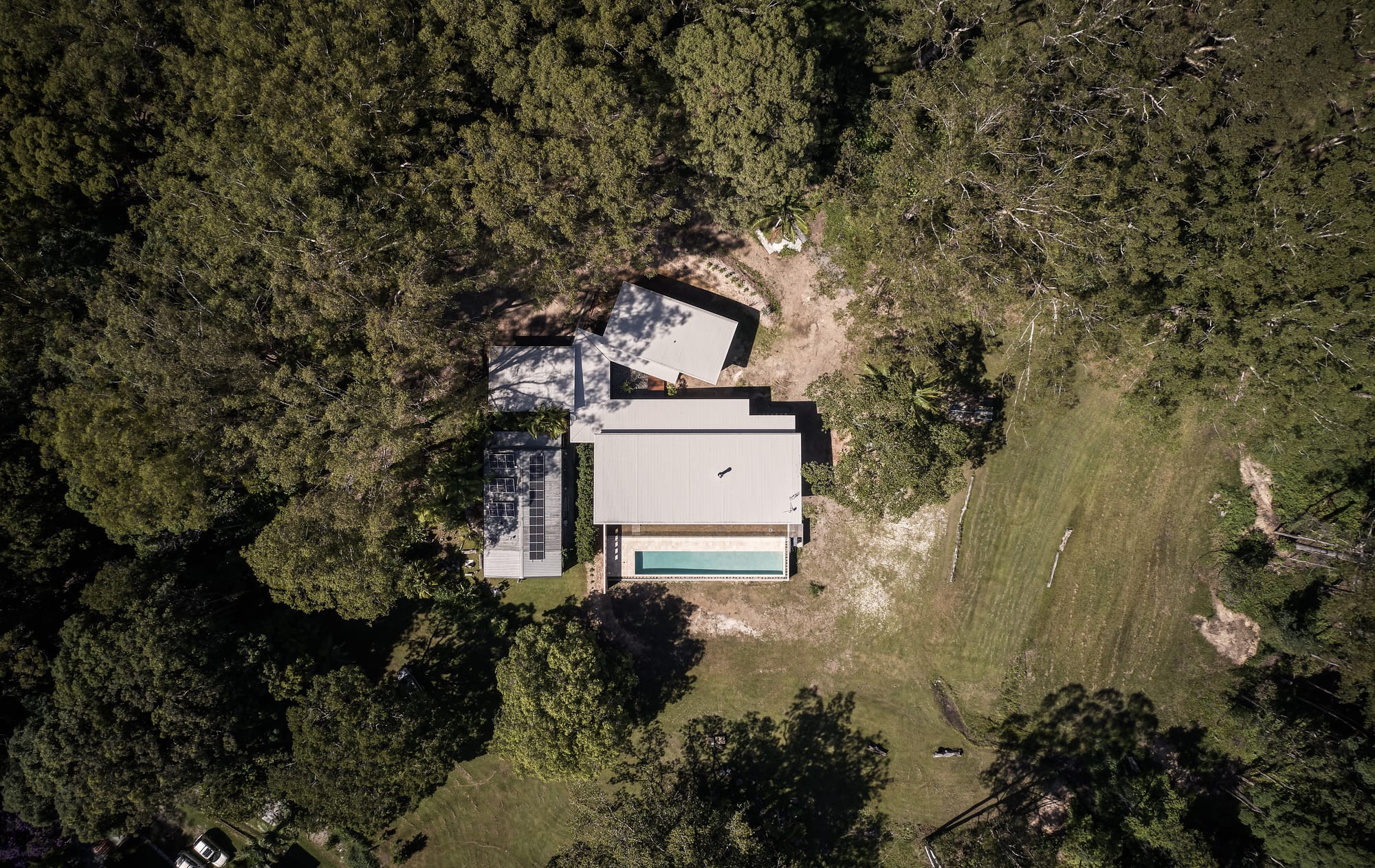 Environmentally conscious, tropical, modern hempcrete architecture surrounded by nature.