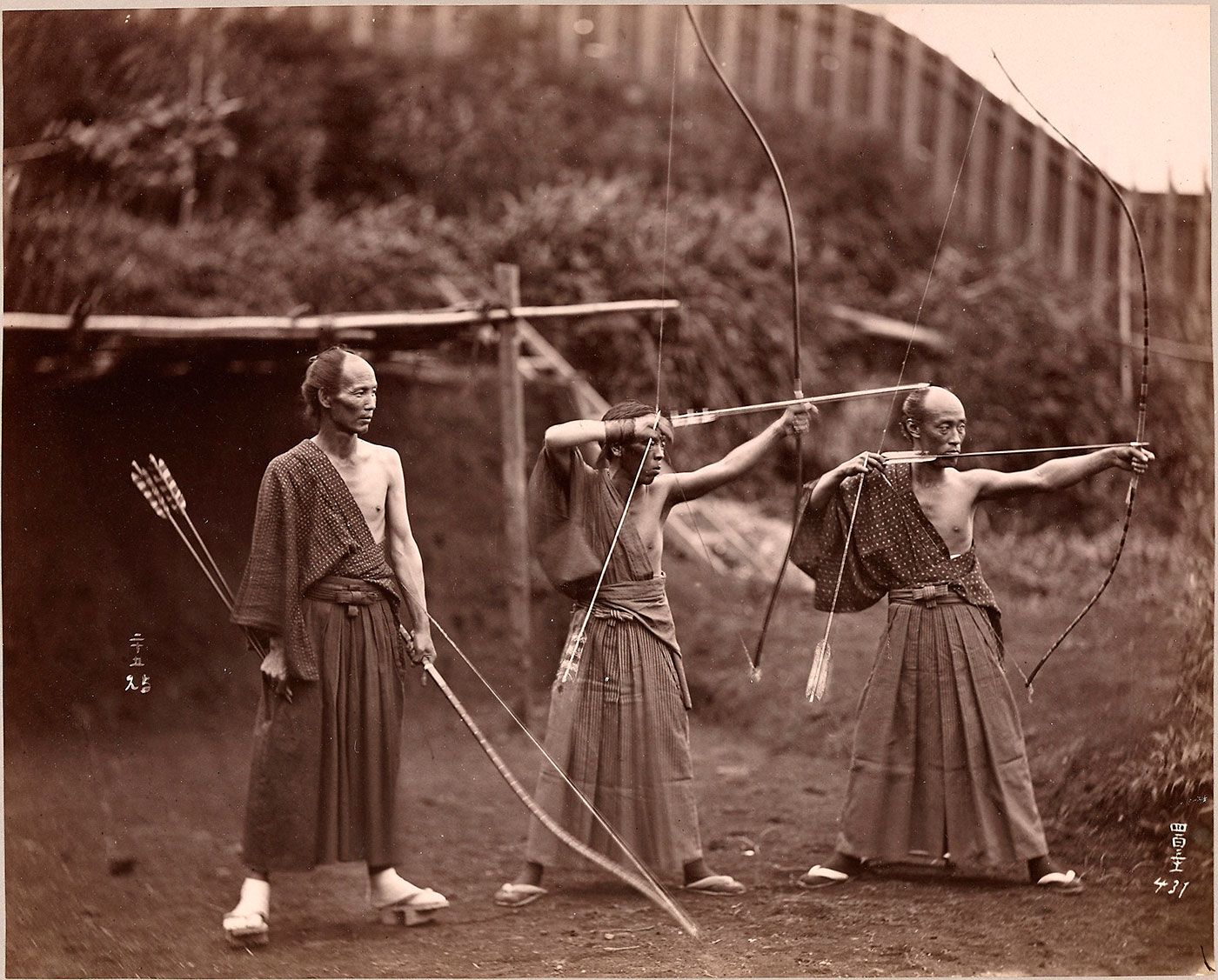 Japanese archers practicing Kyudo.