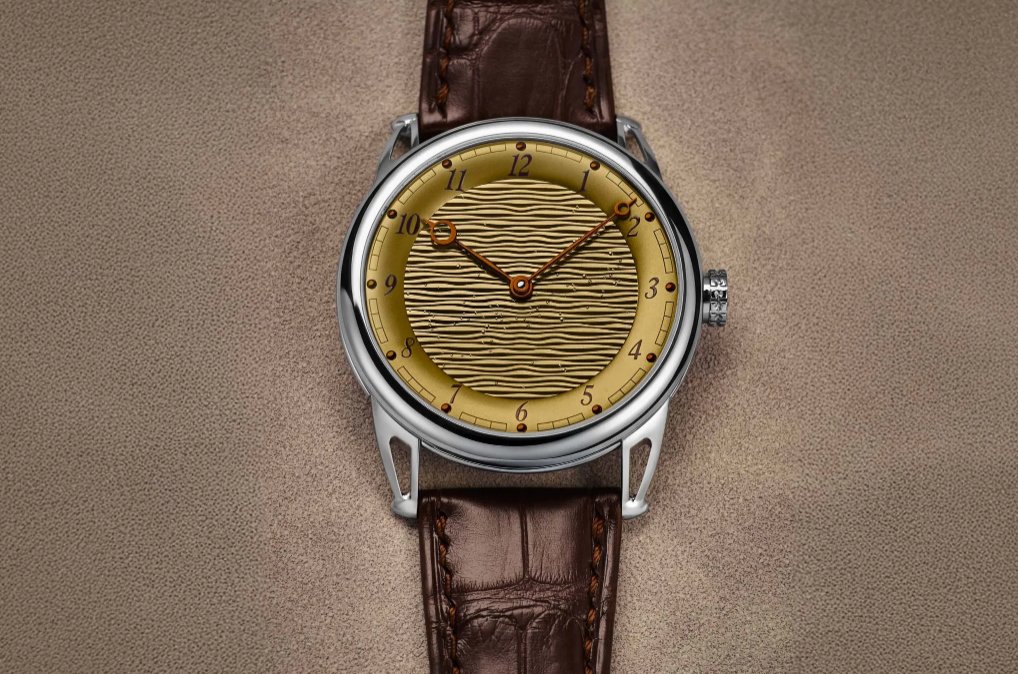 De Bethune DB25xs Sand Winds – Yellow heat‑oxidised titanium edition introduced.