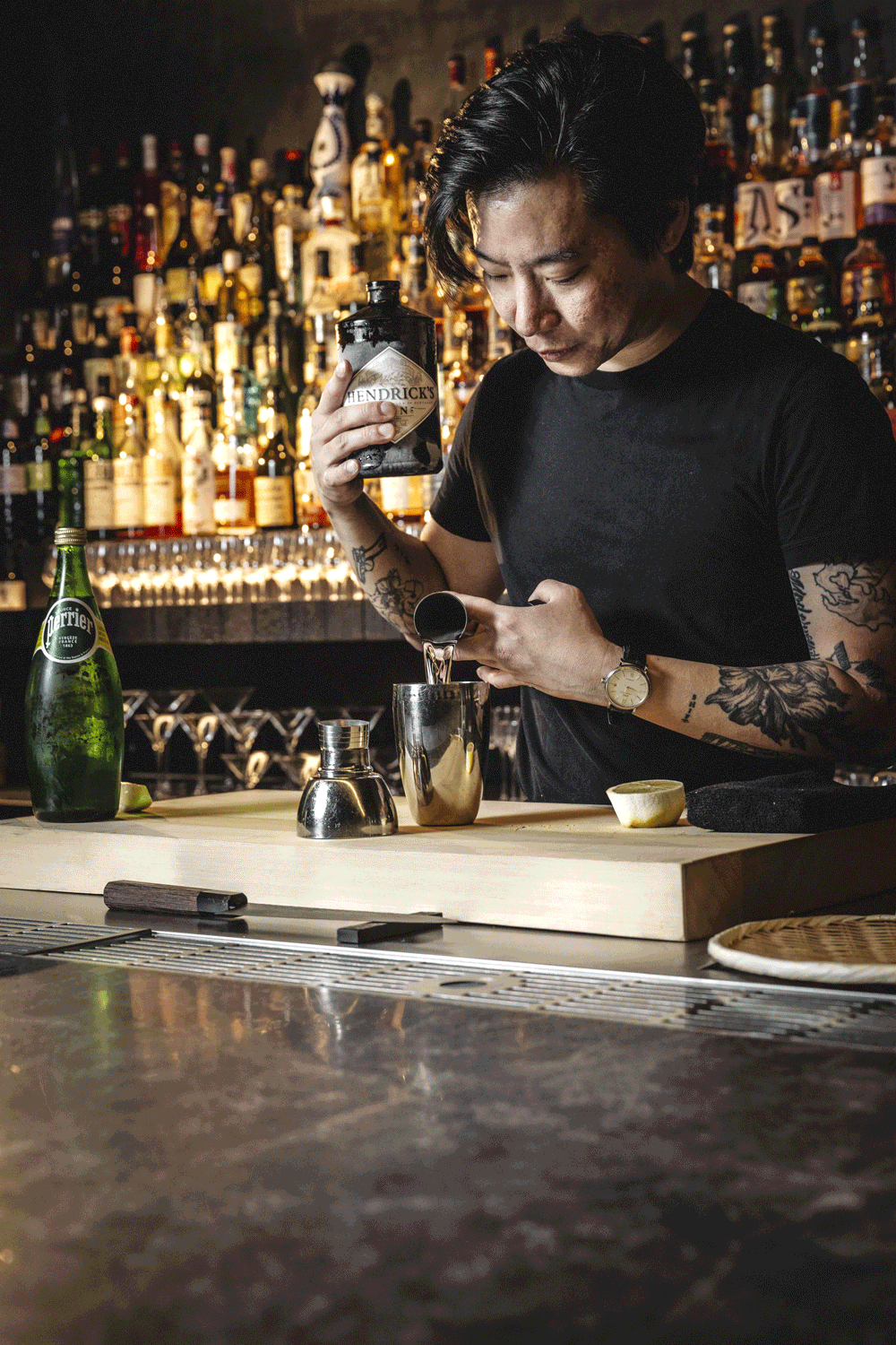Owner-bartender of Bar Sumi, Wen Wang, makes a John Collins. Photos: Christopher Pearce/Boothby