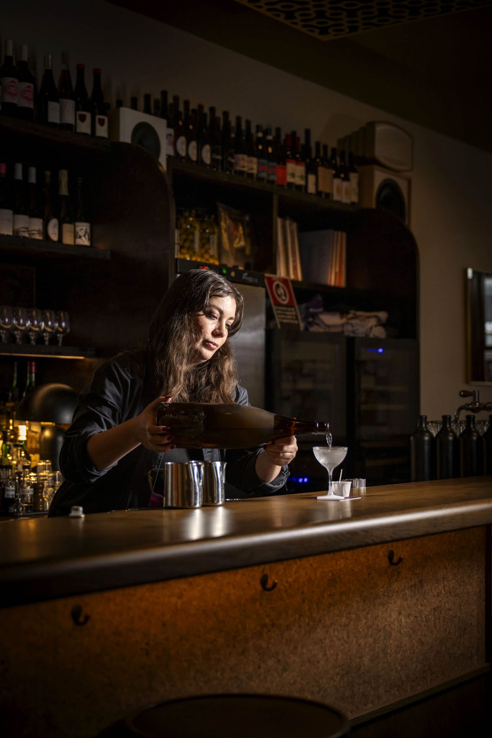 Claudia Morgan pours their house Martini. Photo: Christopher Pearce/Boothby