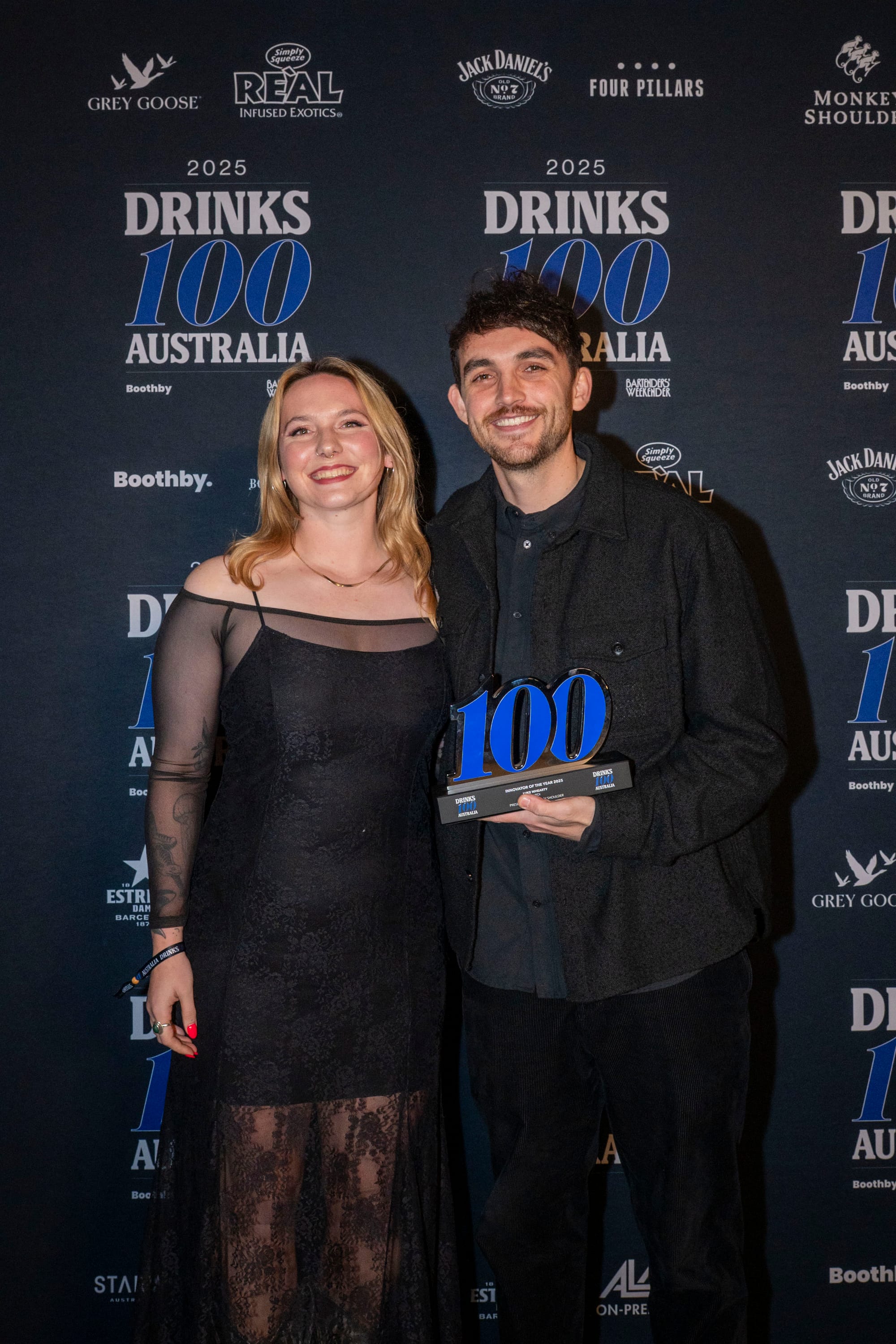 Samuel Thornhill (right) accepted the Innovator of the Year award on behalf of the winner, Luke Whearty, from  Monkey Shoulder's Rachel Bartlett. Photo: Christopher Pearce/Bartenders' Weekender