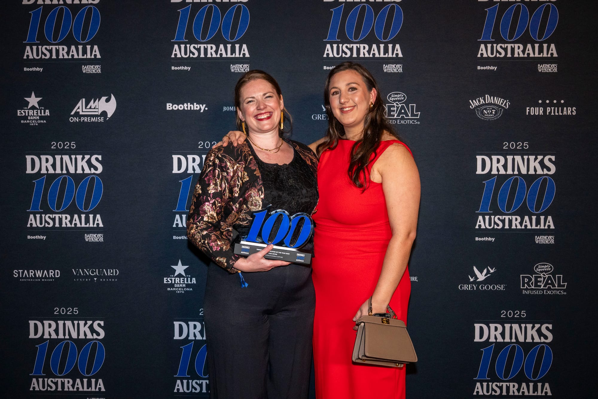 Cara Devine (left) was awarded Drinks Communicator of the Year by Bombay Sapphire's Kayla Grigoriou. Photo: Christopher Pearce/Bartenders' Weekender