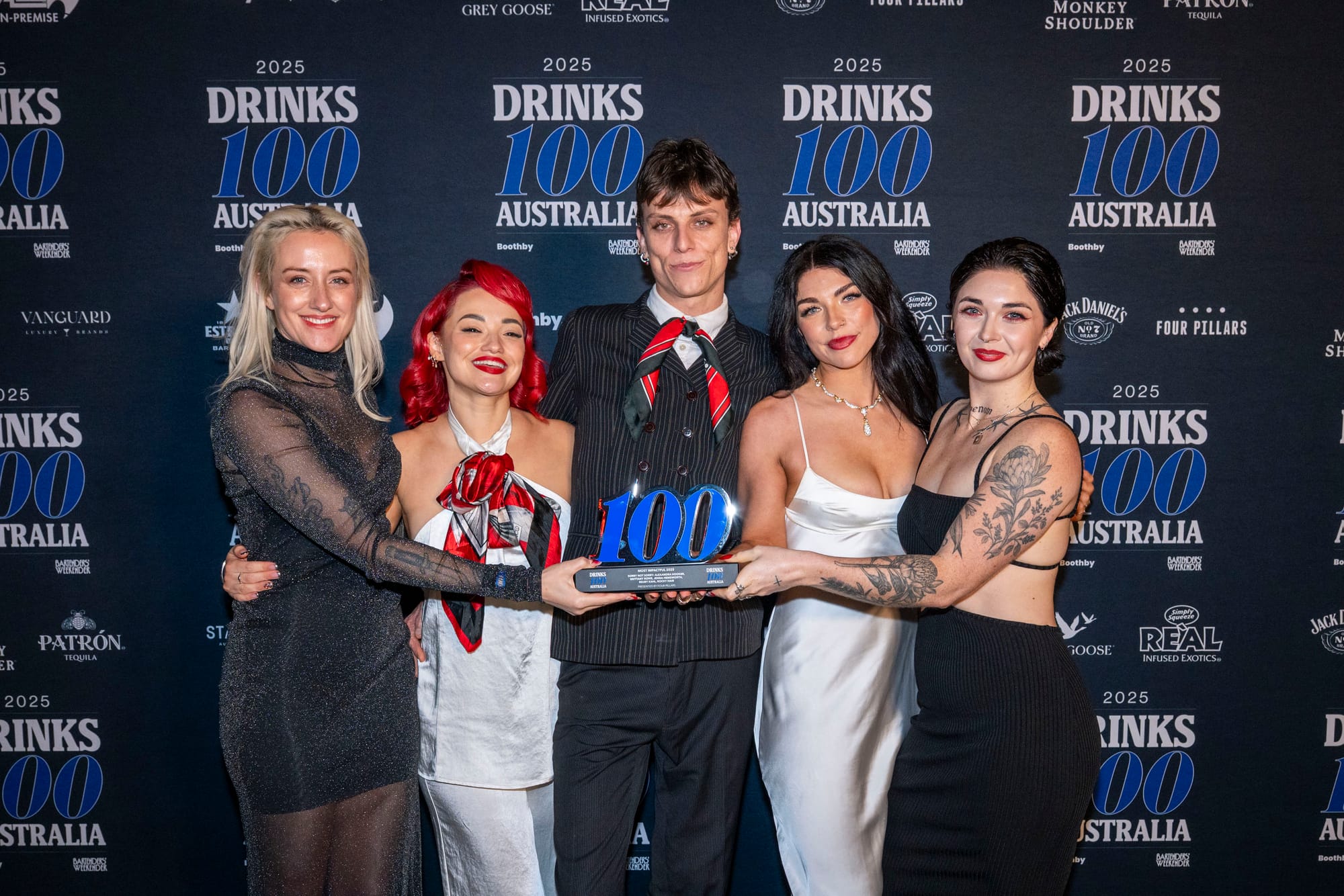 Jenna Hemsworth with the Sorry, Not Sorry collective, picking up the trophy for Most Impactful at the Drinks 100 Australia awards gala. Photo: Christopher Pearce/Bartenders' Weekender