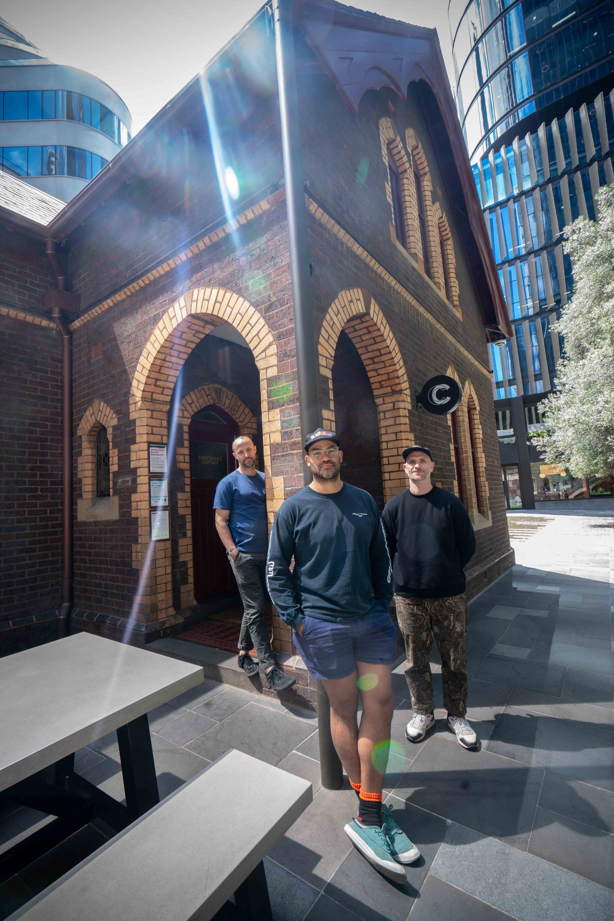 Ryan, Matt, and Rob outside Caretaker's Cottage in Melbourne. Photo: Fred Siggins