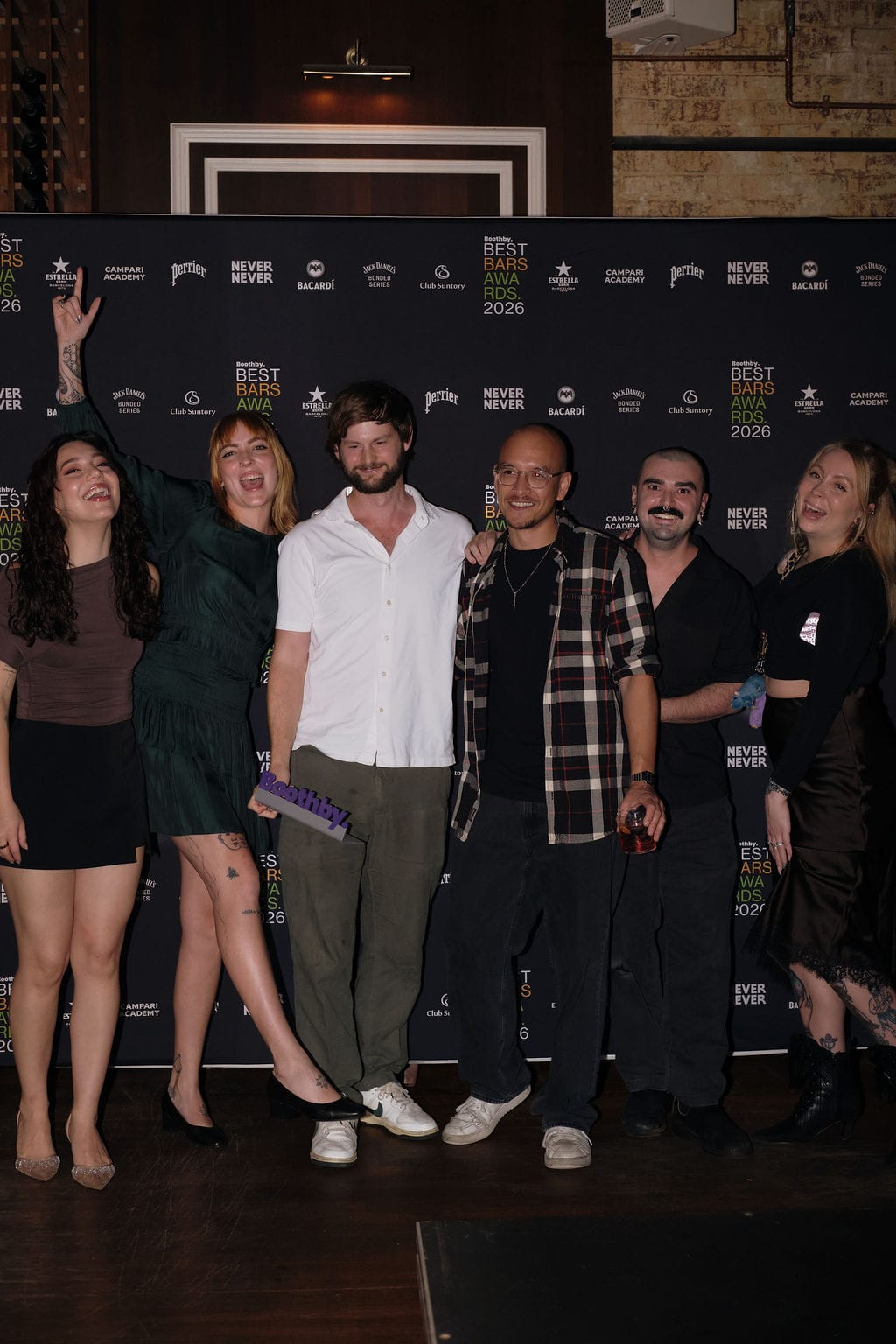 The Shaman team celebrates their win for Best New Bar in Queensland presented by Bacardi, with brand ambassador Lucille Rose-Hopkins (right).