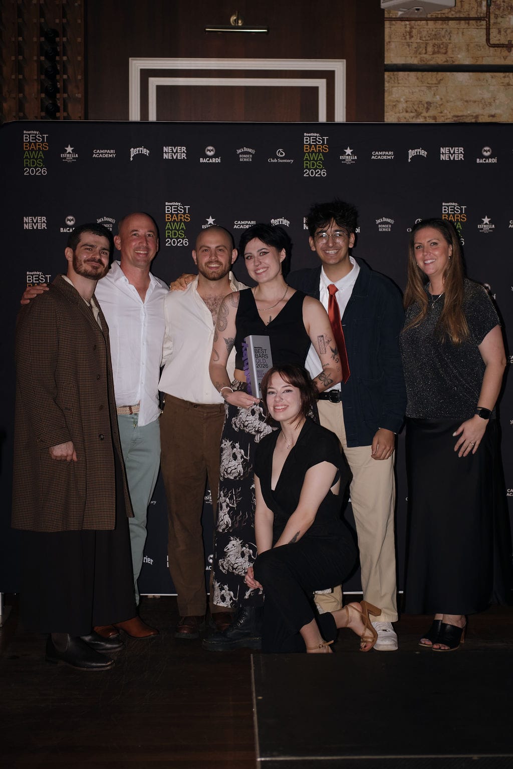 The Savile Row team collect the award for Best Cocktail Bar in Queensland presented by Perrier, with Boothby's Lauren Barbato (right)