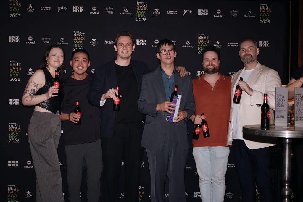 The Milquetoast team collects the trophy for Best Bar Eats in Queensland presented by Estrella Damm with Will Cowley (right). Photo: Mikayla Adams