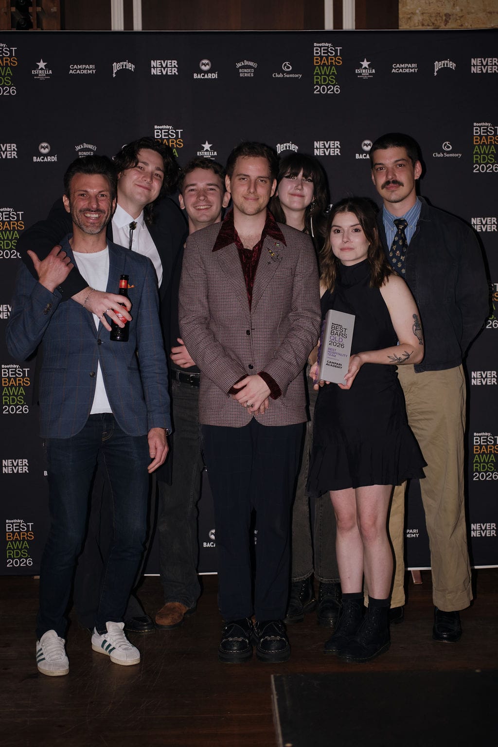 The Gresham team pick up the trophy for the Best Hospitality Team in Queensland presented by Campari Academy, with brand ambassador Jay Lambert (left). Photo: Mikayla Adams