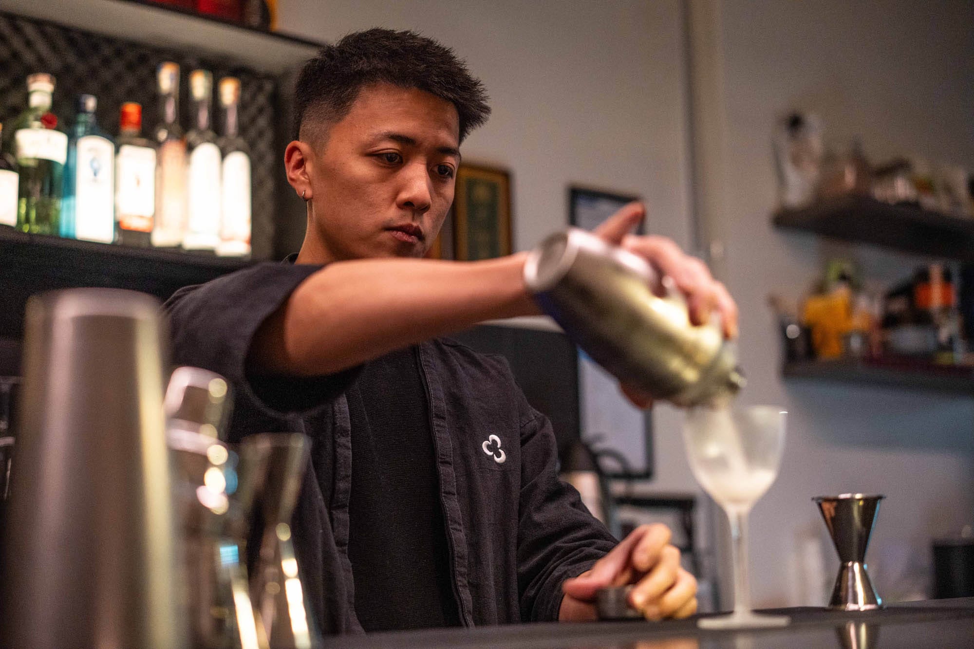 Owner William Wu behind the bar. Photo: Fred Siggins