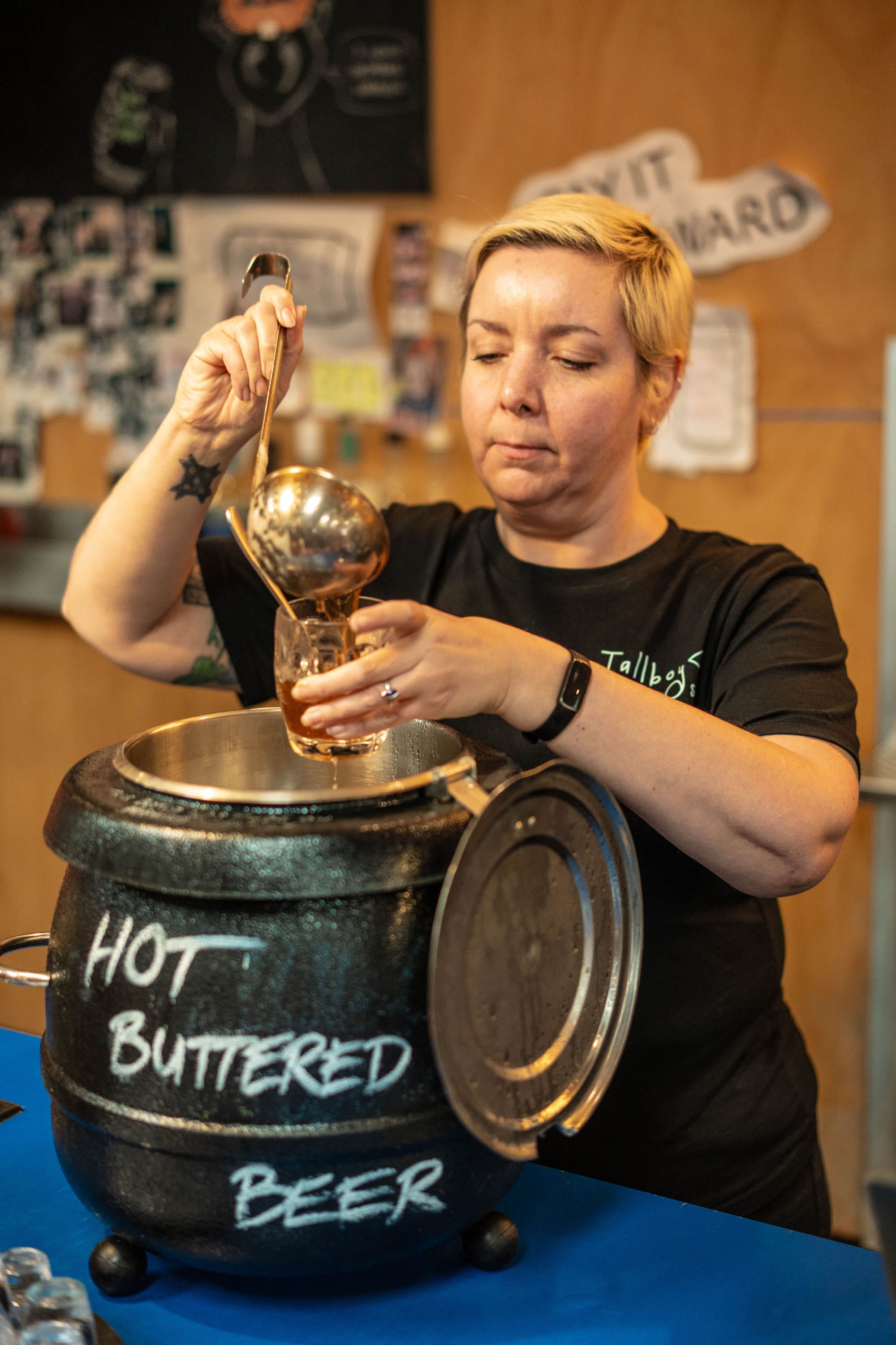 Jane Eira ladles up the Hot Buttered Beer. Photo: Fred Siggins