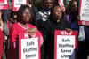 Nurses from Providence Hospital with National Nurses United (NNU) on strike in Providence, R.I., November 12, 2014.   Credit: UFCW Local 400,  CC BY 2.0 license.