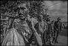 A deportee among people living on the street, lined up for food at a distribution center in downtown Tijuana, Baja California Norte, Mexico.  All photos © David Bacon.