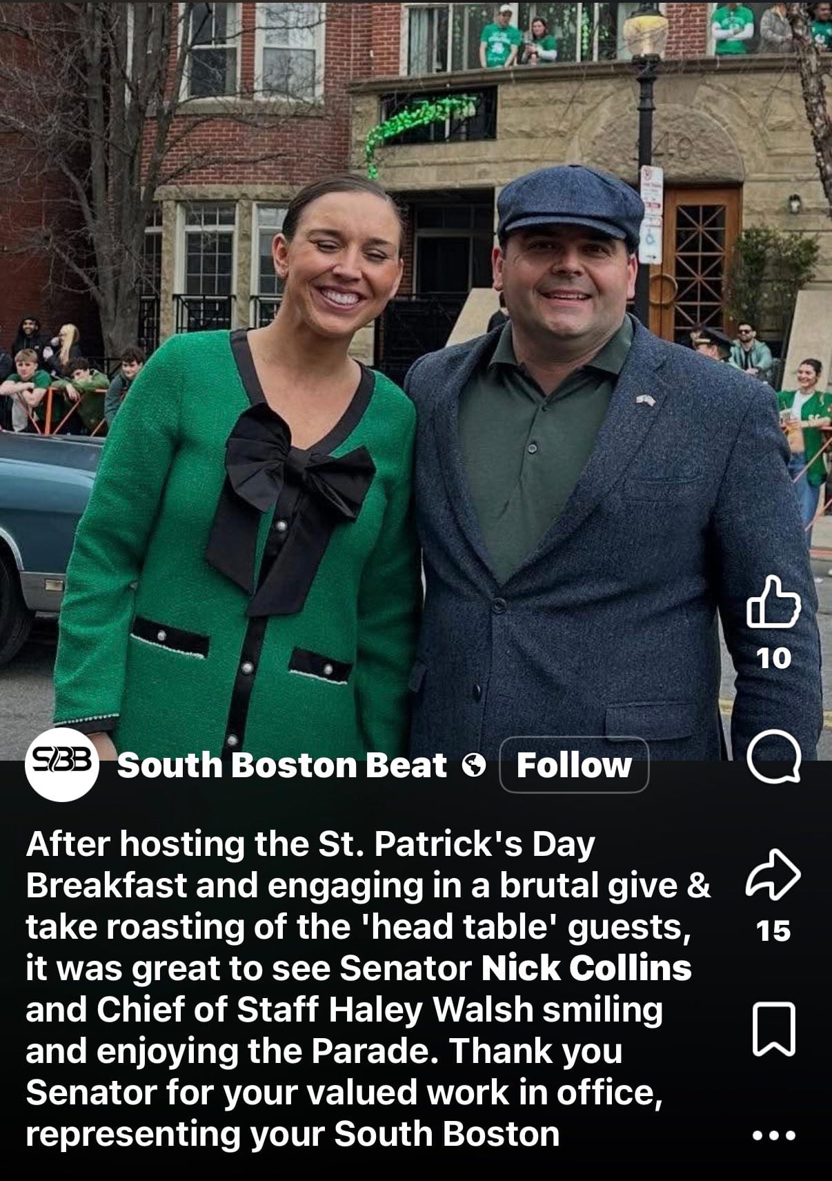 State Senator Nick Collins and his chief of staff, Haley Walsh, smile together along the route of Boston’s St. Patrick’s Day Parade. The image is a screenshot of a South Boston Beat social media post.