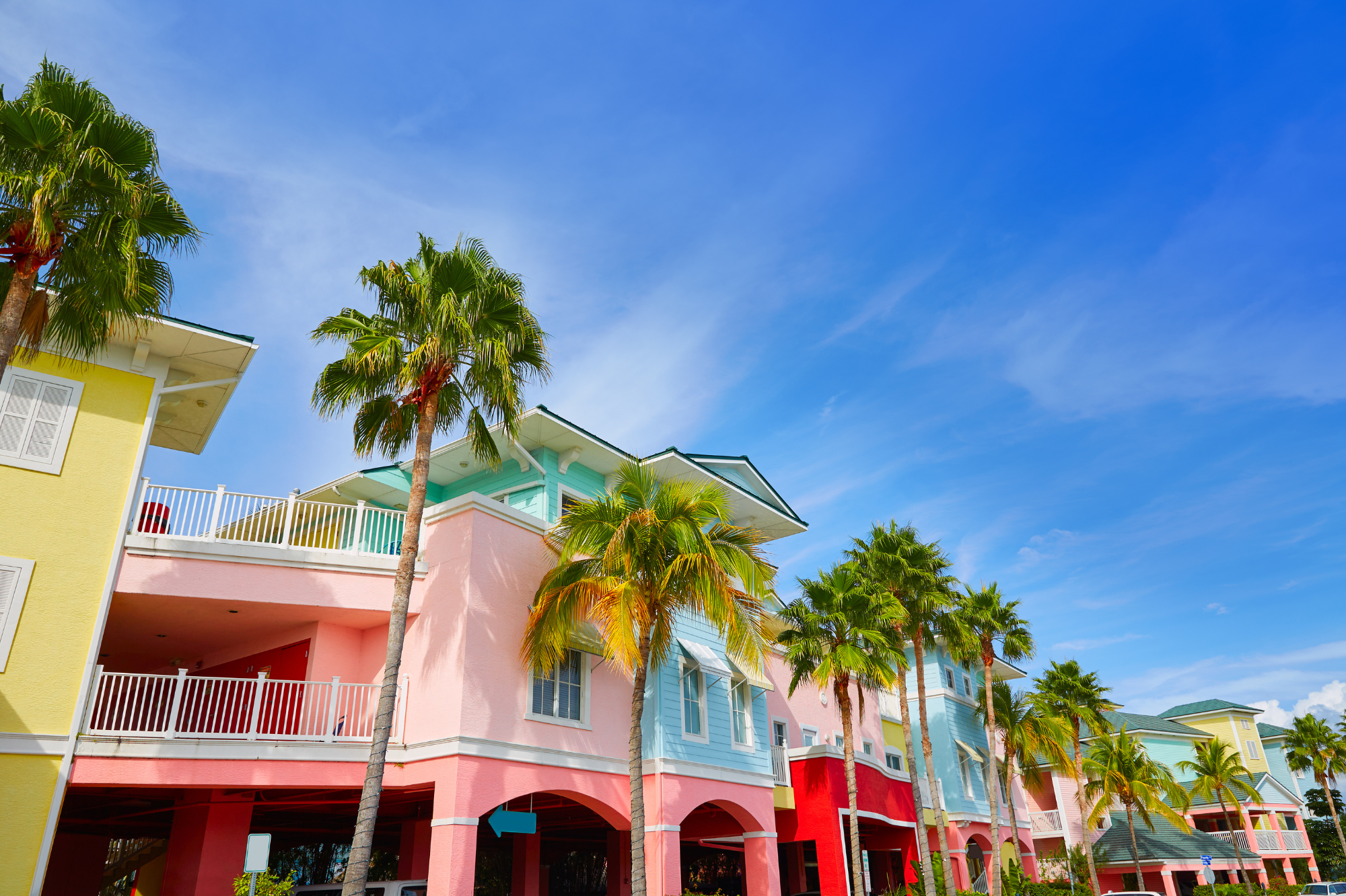 A row of colorful buildings lining the street of downtown Ft Myers, FL