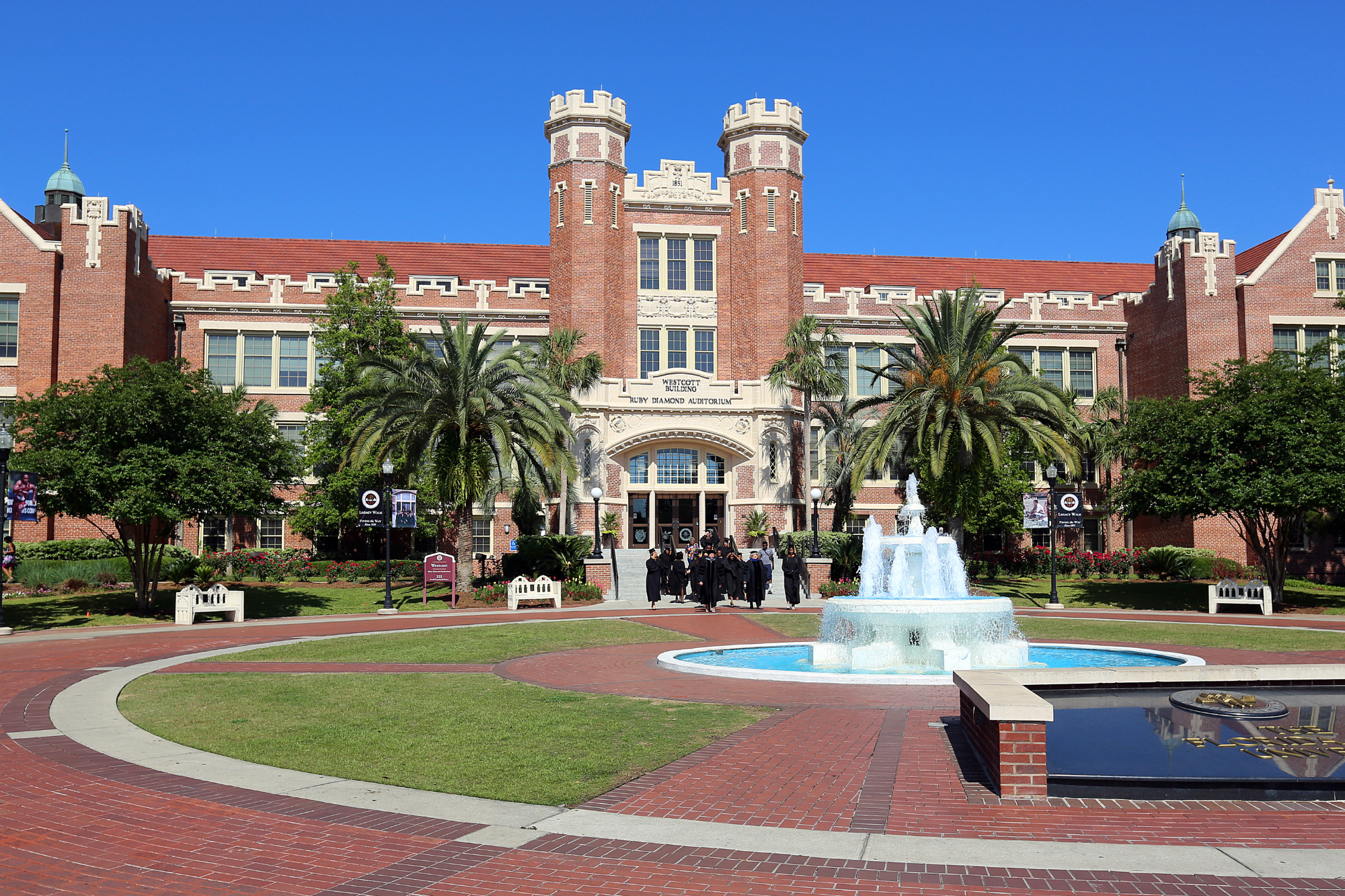 Florida State University with a water fountain and trees in front of the building