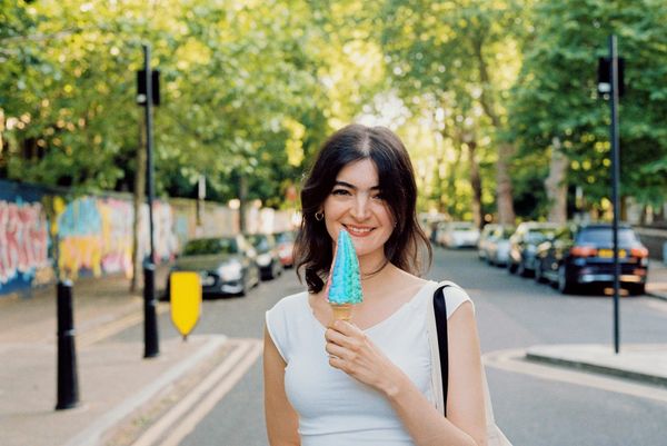 Rainlights on a street in spring, happy with ice cream