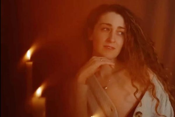 Hillary Reynolds in candle light